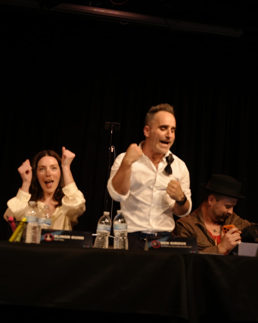 Ben Giroux and cast performing an energetic moment at the table read