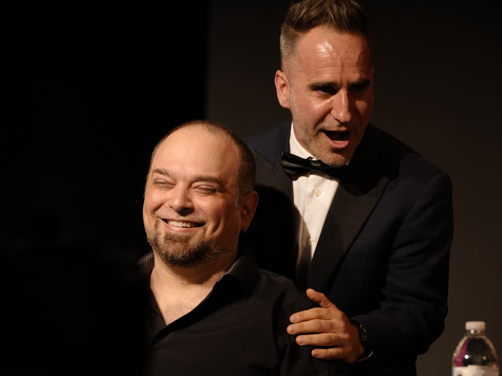 Ben Giroux sharing a laugh with a table-read performer